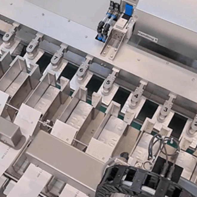 Custom RoboMat machine for blister infeed in pharmaceutical packaging processes