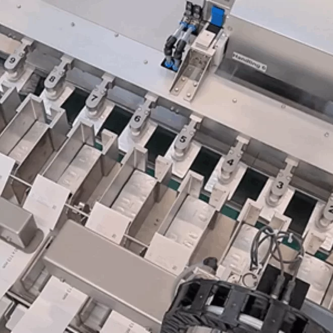 Custom RoboMat machine for blister infeed in pharmaceutical packaging processes